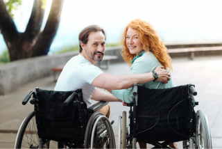 Couple-in-wheelchairs