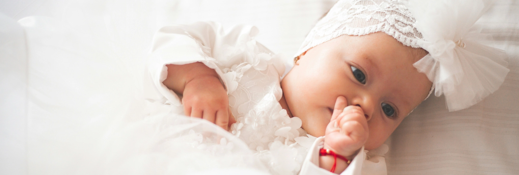 Baby with thumb in mouth